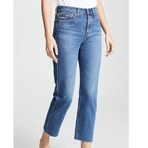LEVI’S Medium Wash Wedgie Straight Raw Hem Jeans